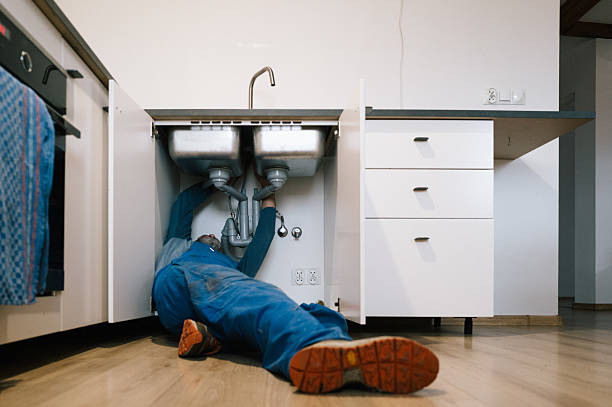 Professional Emergency Plumber technician working in Fall City, WA